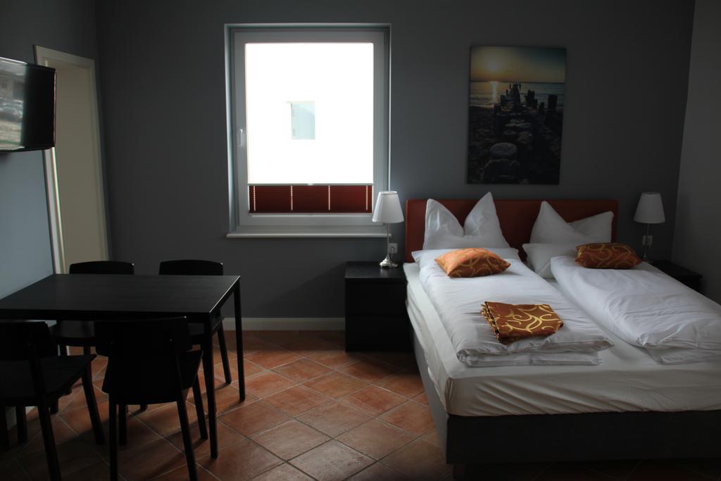 Apartmenthaus Unterwegs Rostock Chambre photo